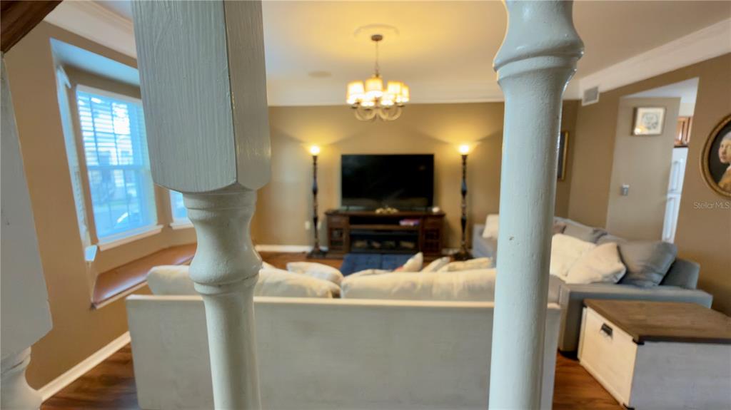 6624 Time Square Avenue, Unit 102 Orlando, FL 32835 - Photo 46 of 96 a living room with furniture and a flat screen tv