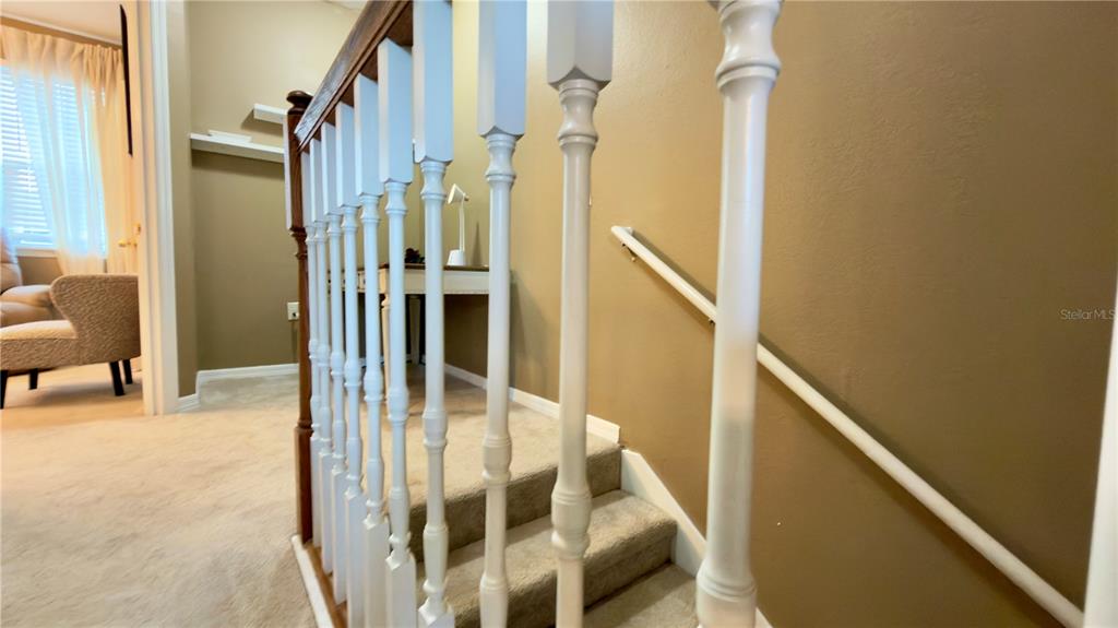6624 Time Square Avenue, Unit 102 Orlando, FL 32835 - Photo 47 of 96 a view of entryway and hall with wooden floor