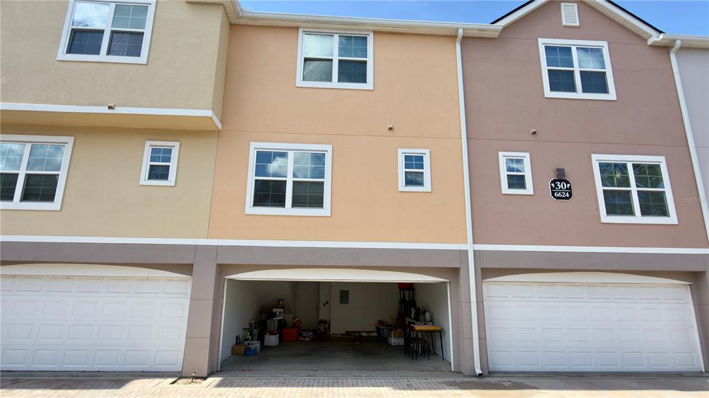6624 Time Square Avenue, Unit 102 Orlando, FL 32835 - Photo 76 of 96 a view of car garage