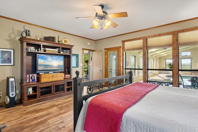 a spacious bathroom with a double vanity sink a large mirror and a bathtub