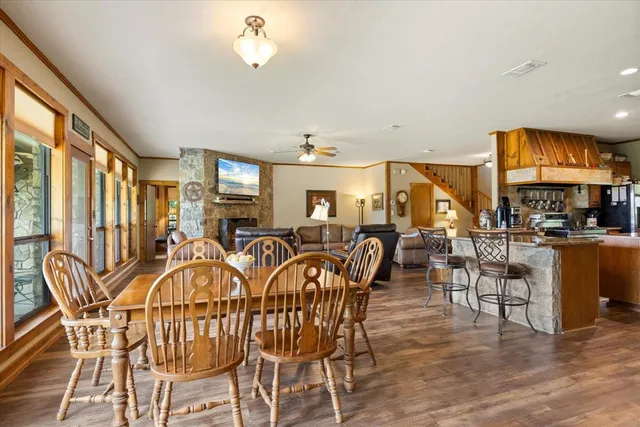 a view of a dining room with furniture window and outside view