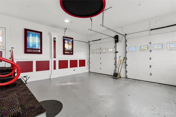 a view of a livingroom with furniture and garage