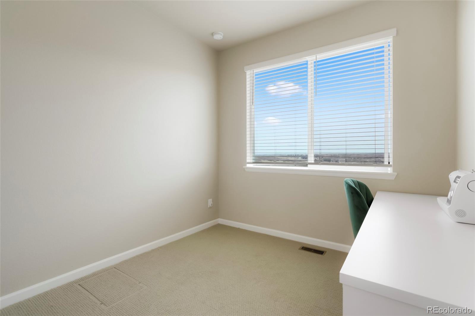 6974 Merseyside Lane Castle Pines, CO 80108 - Photo 13 of 27 a view of a room with a window