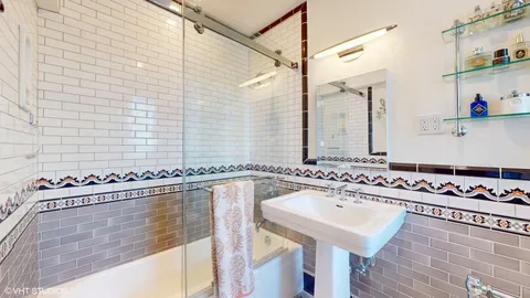 a bathroom with a sink and a bathtub