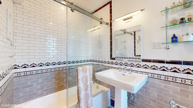 a bathroom with a sink and a bathtub