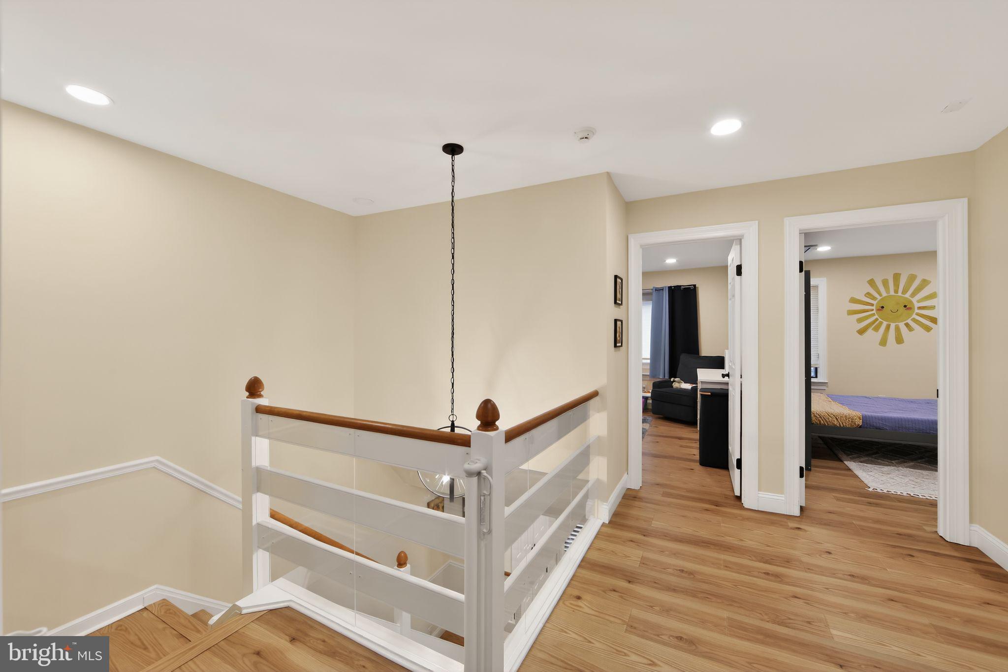 932 Hedgerow Court Blue Bell, PA 19422 - Photo 14 of 40 a view of hallway with stairs and wooden floor