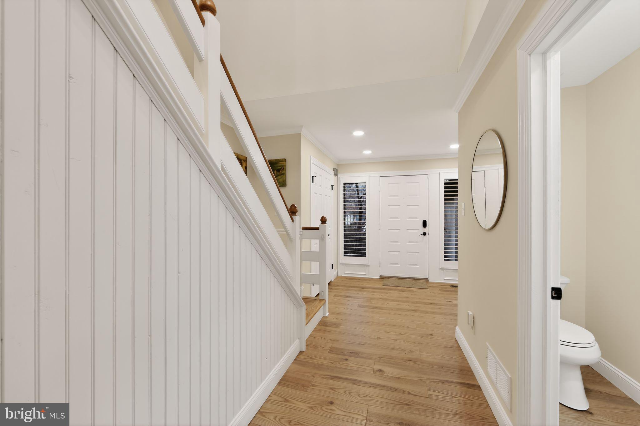 932 Hedgerow Court Blue Bell, PA 19422 - Photo 15 of 40 a view of a hallway with wooden floor and staircase