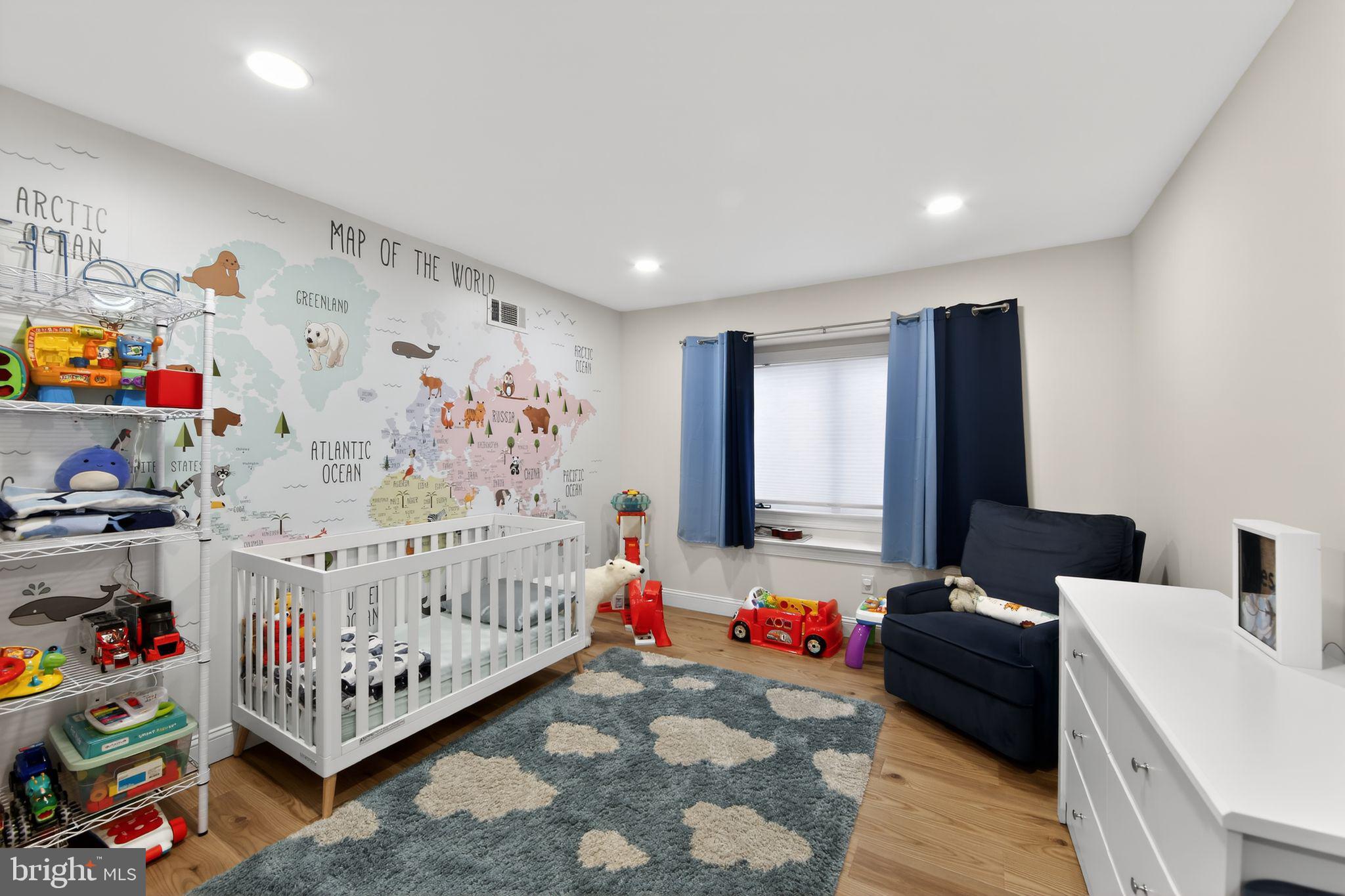 932 Hedgerow Court Blue Bell, PA 19422 - Photo 28 of 40 a bedroom with furniture and a baby crib
