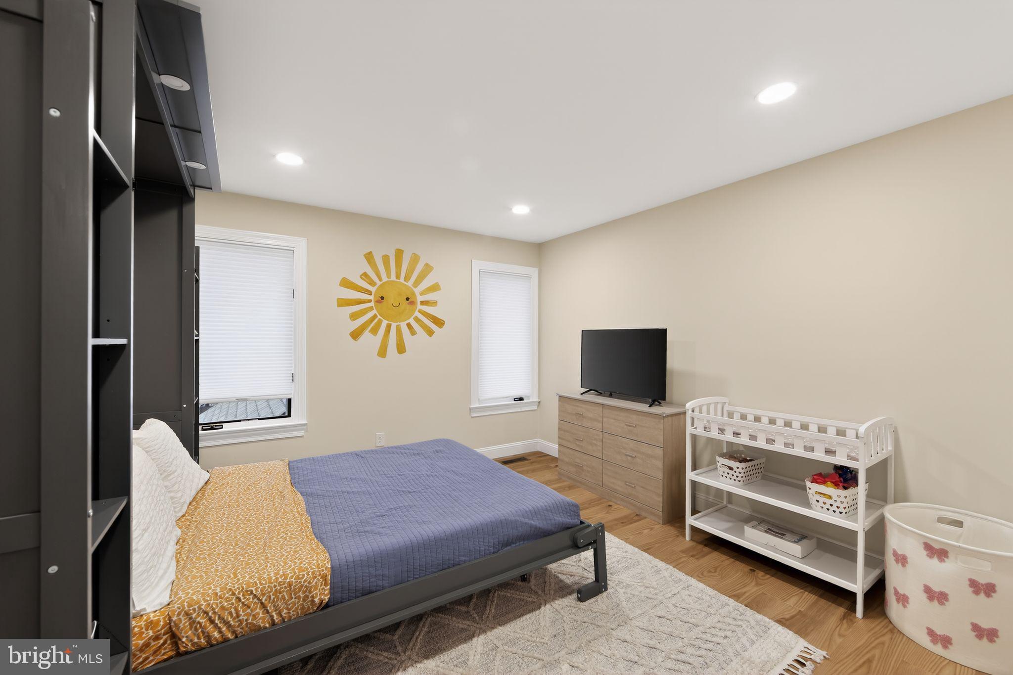 932 Hedgerow Court Blue Bell, PA 19422 - Photo 30 of 40 a bedroom with a bed and a flat screen tv