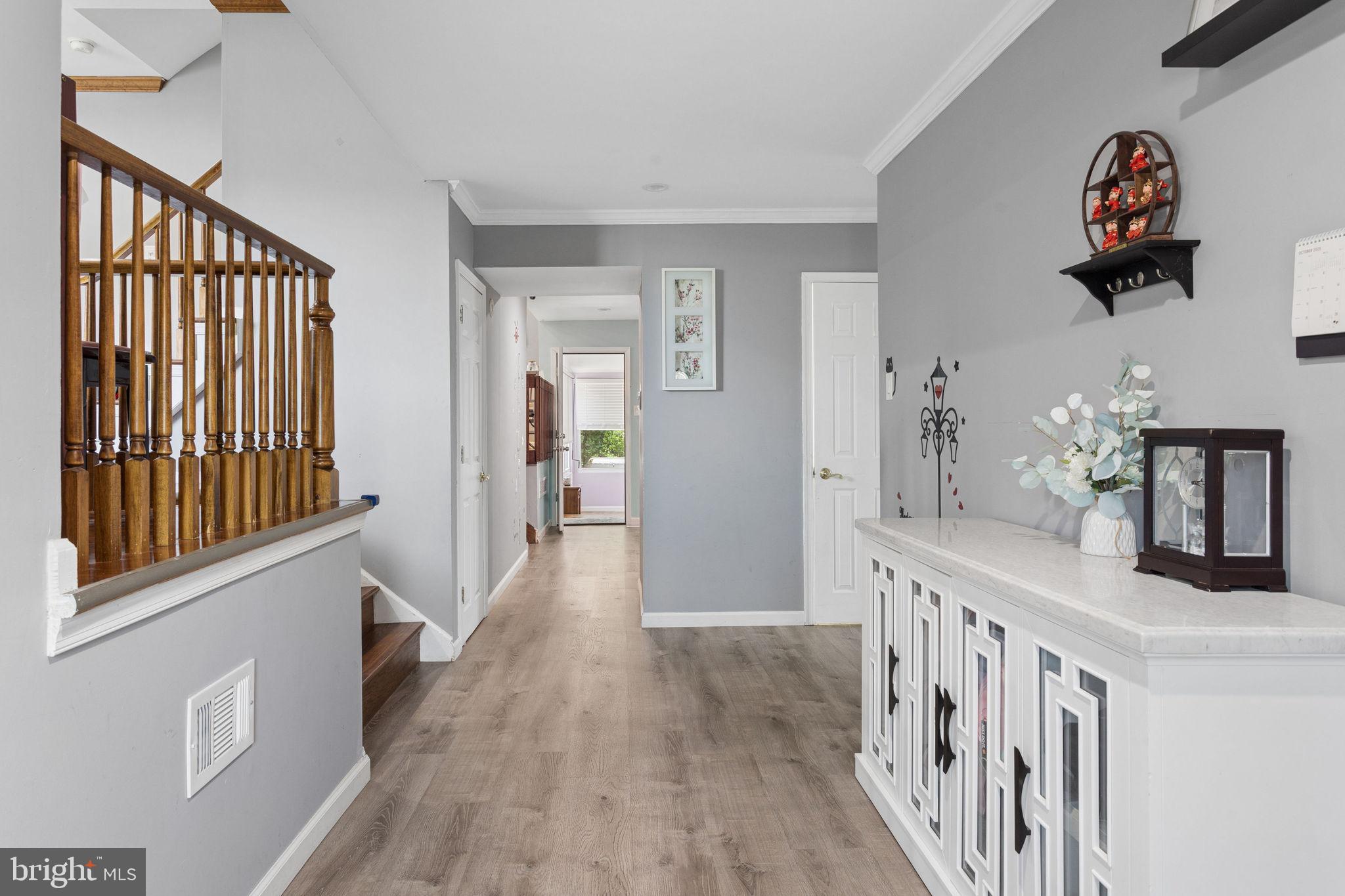 252 Sandringham Road Cherry Hill, NJ 08003 - Photo 4 of 31 a view of an entryway with wooden floor