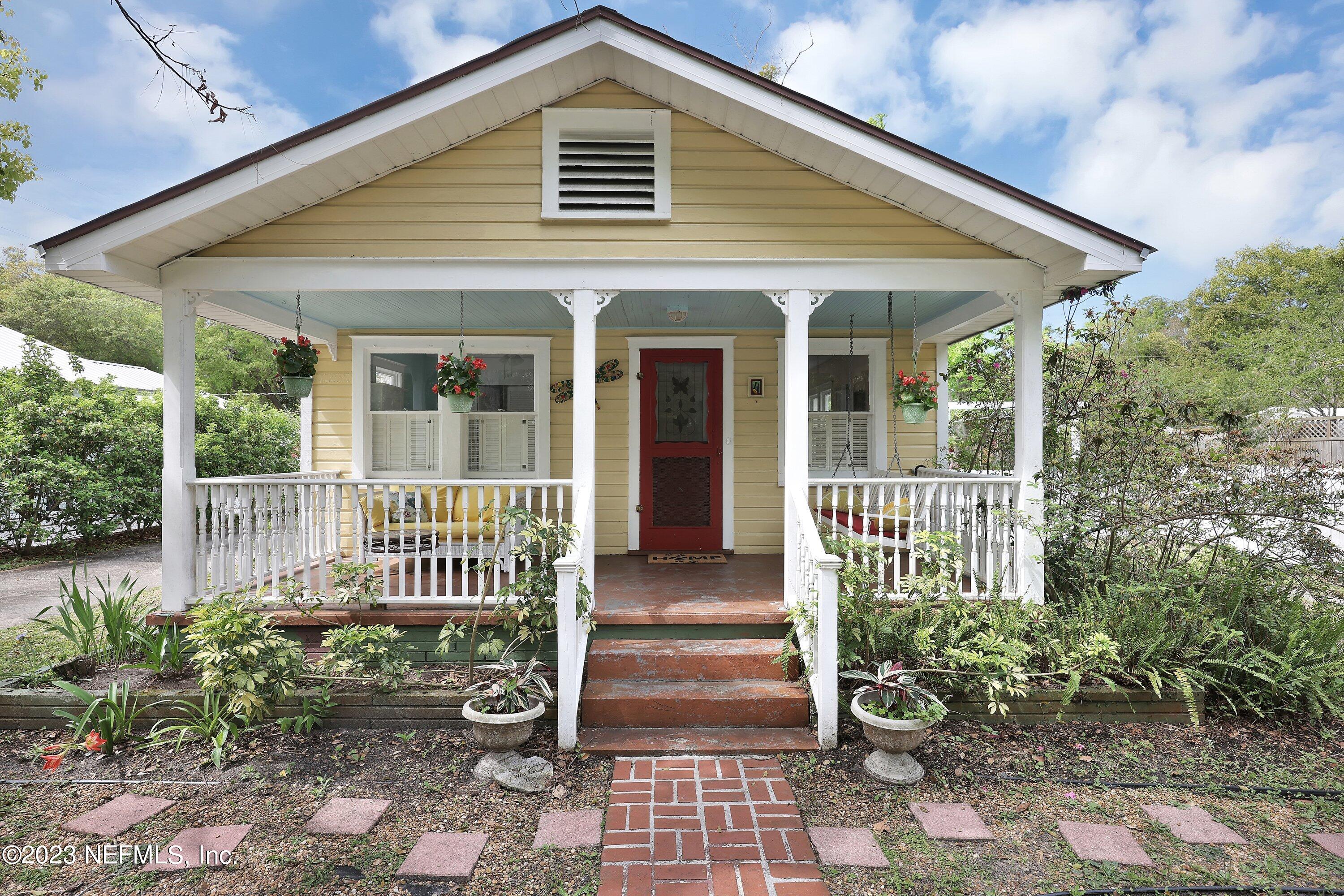 a front view of a house with a porch