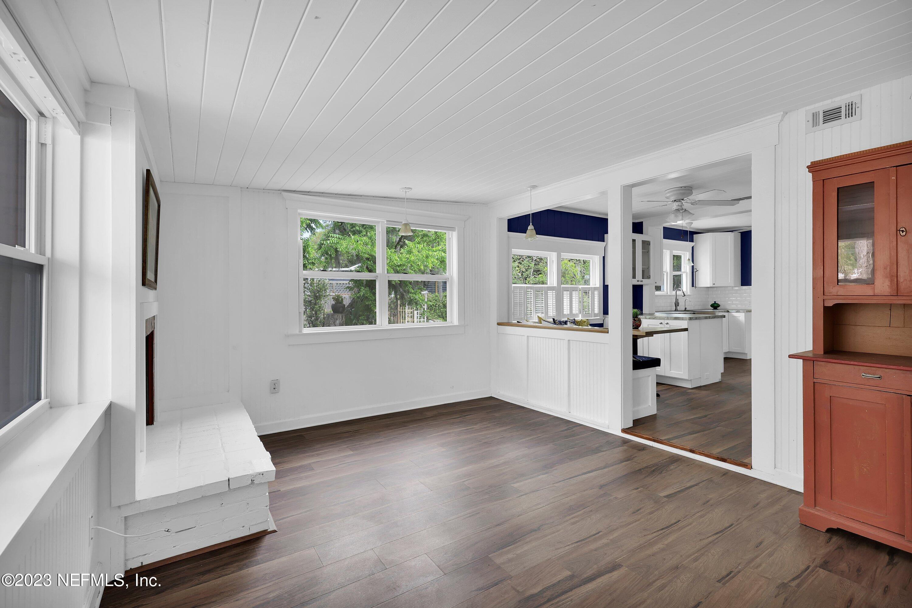 4 Florida Avenue St. Augustine, FL 32084 - Photo 13 of 52 a view of an empty room with wooden floor and a window