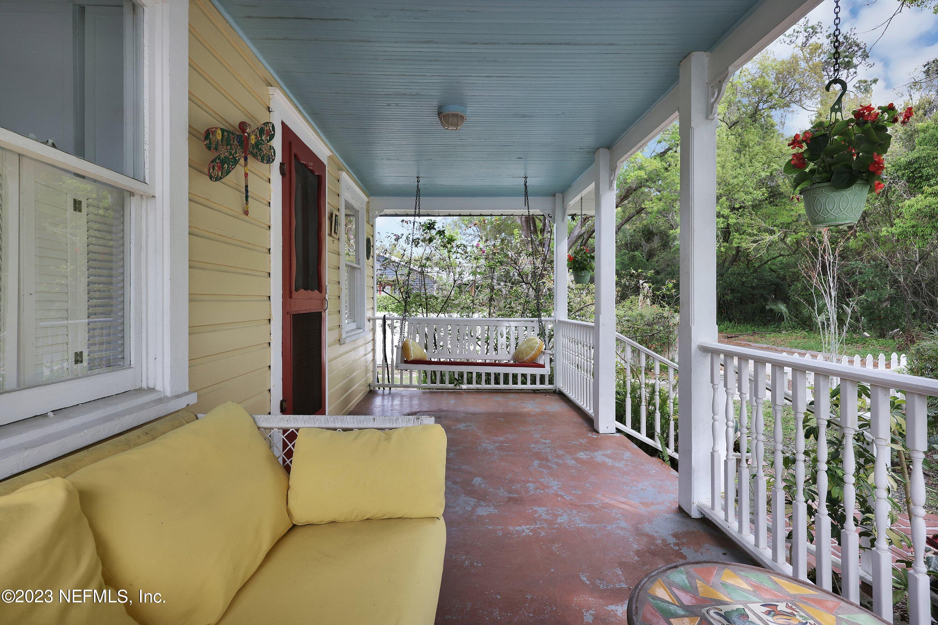4 Florida Avenue St. Augustine, FL 32084 - Photo 2 of 52 a balcony with furniture and garden view