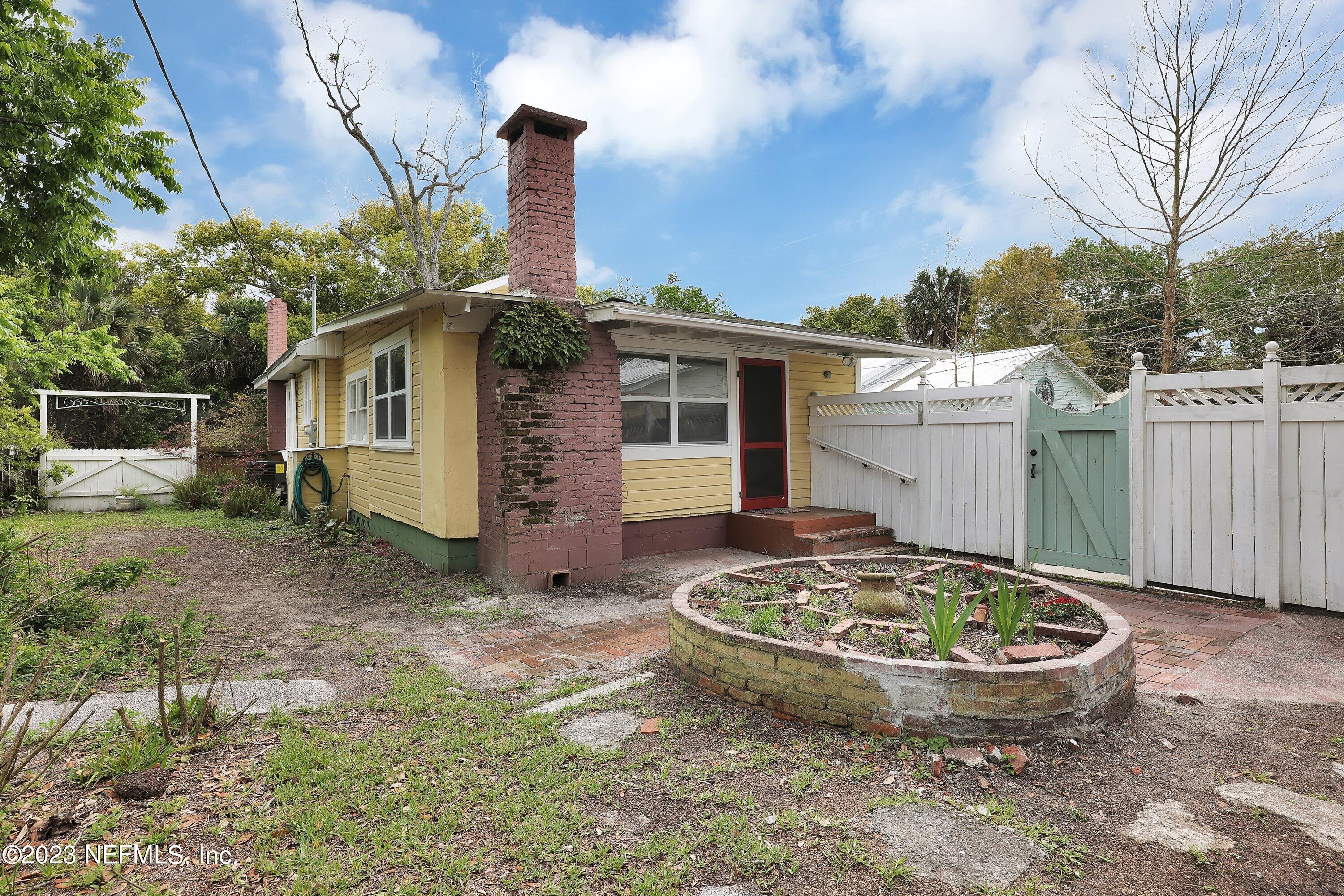 4 Florida Avenue St. Augustine, FL 32084 - Photo 29 of 52 a view of a house with backyard