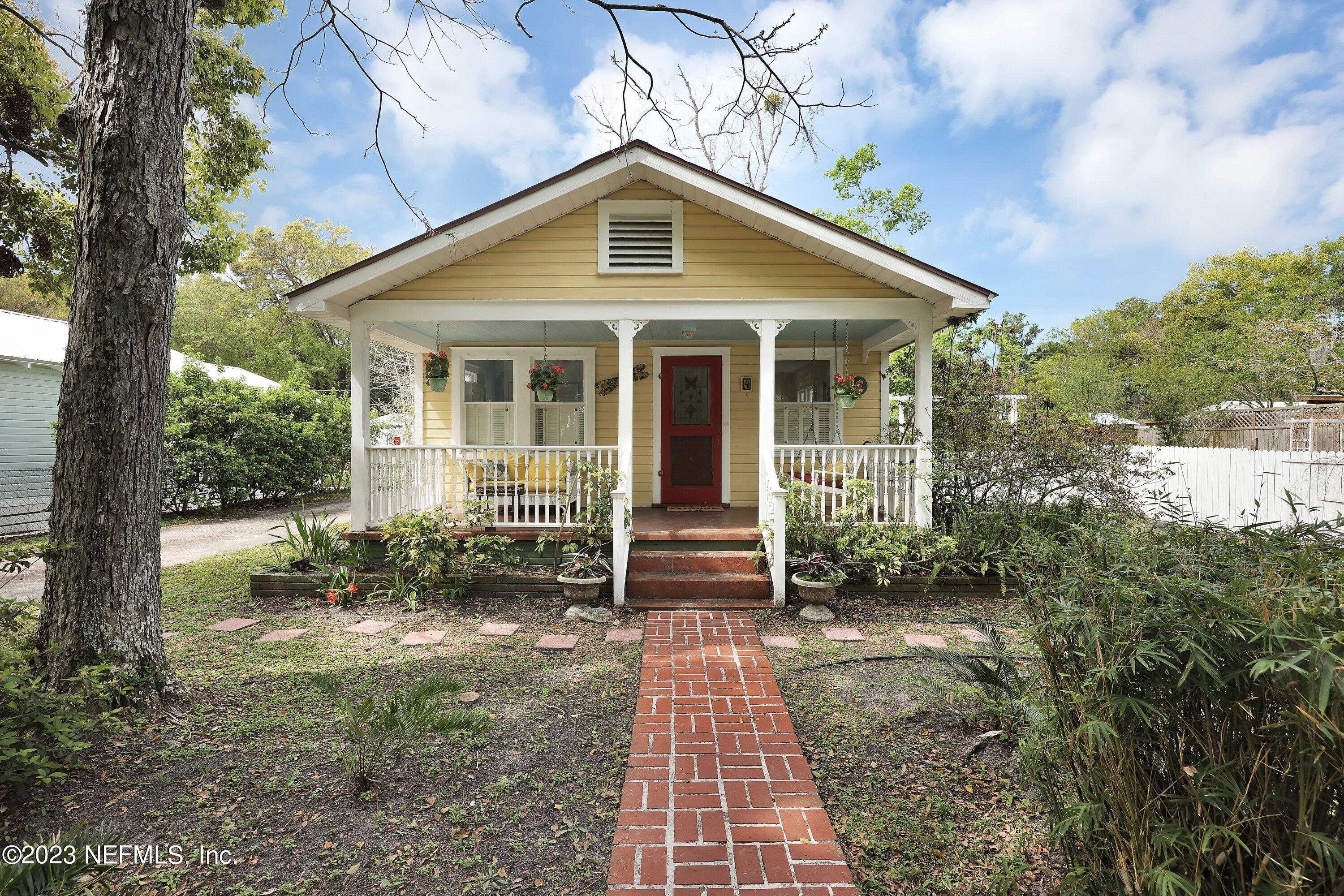 4 Florida Avenue St. Augustine, FL 32084 - Photo 52 of 52 a front view of a house with a yard