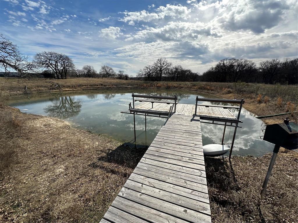 7401 Briar Road Azle, TX 76020 - Photo 15 of 23 a view of a lake with chairs