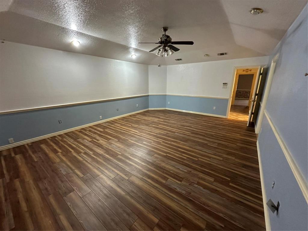 7401 Briar Road Azle, TX 76020 - Photo 6 of 23 a view of an empty room with a window