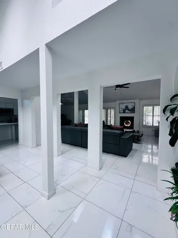 a view of a house with outdoor space and sitting area