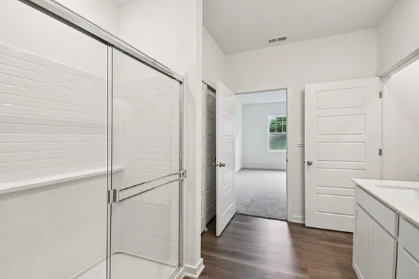 a view of an empty room with a window