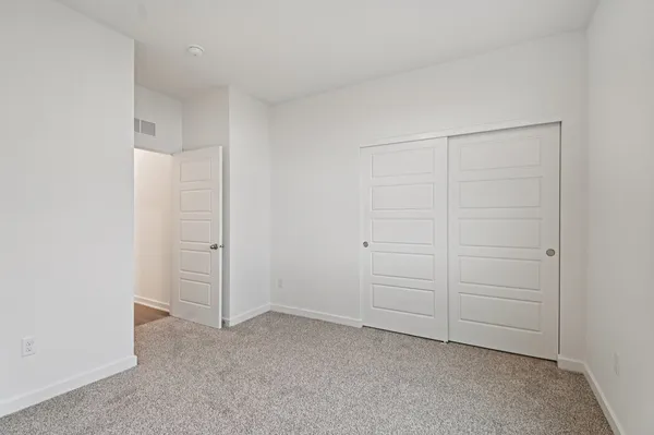 a bathroom with a sink toilet and vanity