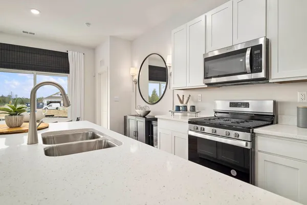 a bedroom with a bed and a cabinets