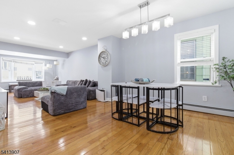 32 Cedar Avenue Elizabeth, NJ 07202 - Photo 2 of 32 a living room with furniture and a large window or wooden floor