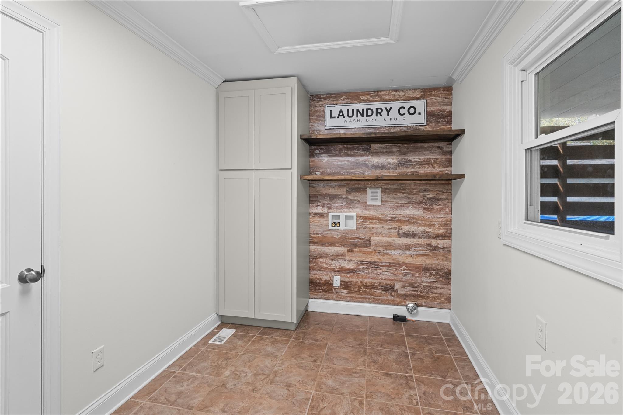 1335 Blacksnake Road Stanley, NC 28164 - Photo 27 of 31 a view of storage and utility room