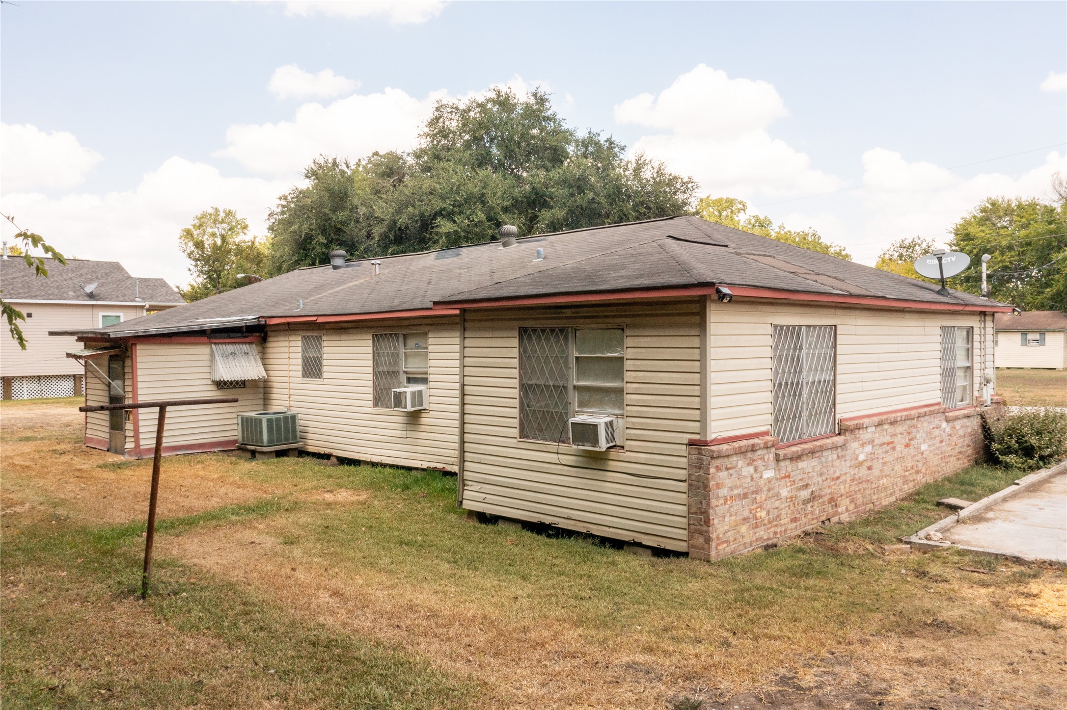 1601 Harris Street Wharton, TX 77488 - Photo 13 of 36 a view of a house with a backyard