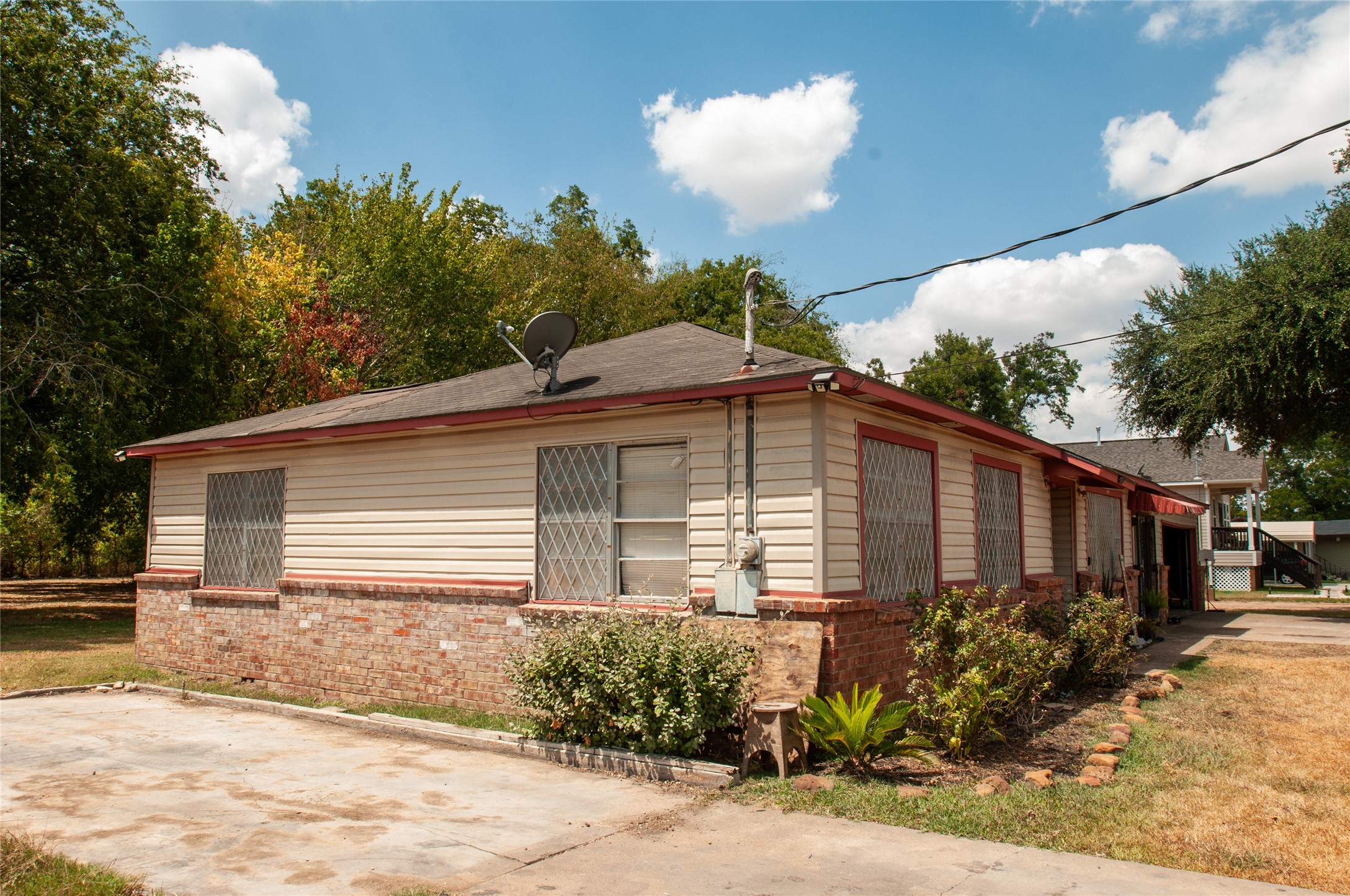 1601 Harris Street Wharton, TX 77488 - Photo 16 of 36 a front view of a house with garden