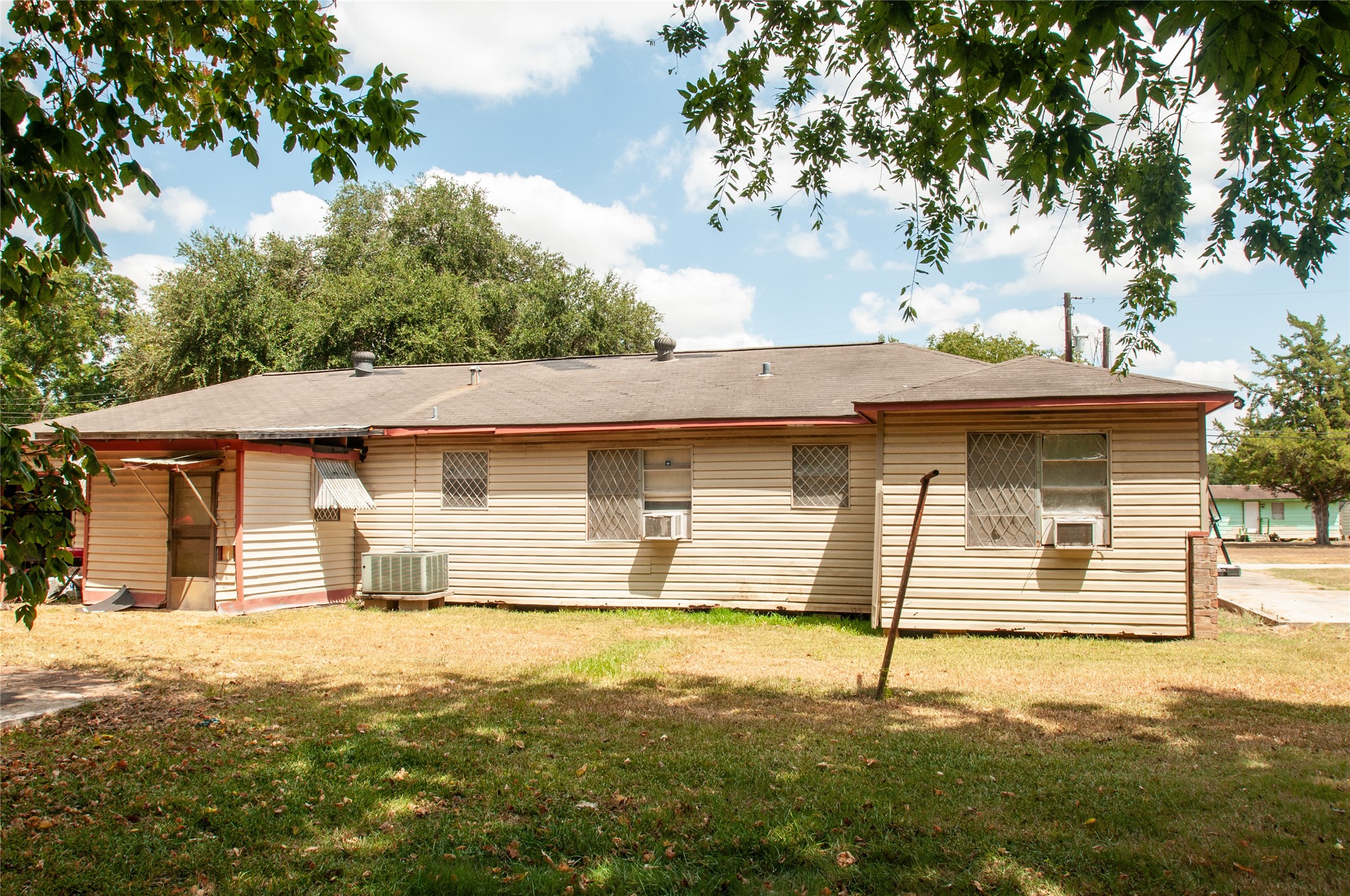 1601 Harris Street Wharton, TX 77488 - Photo 17 of 36 a front view of a house with a yard