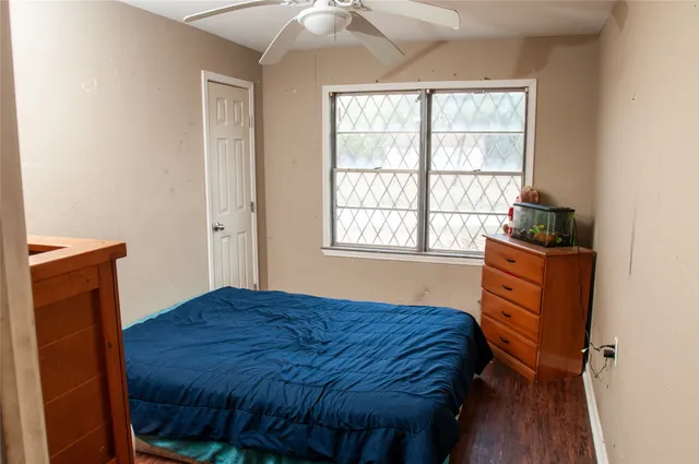 a living room with furniture and flat screen tv