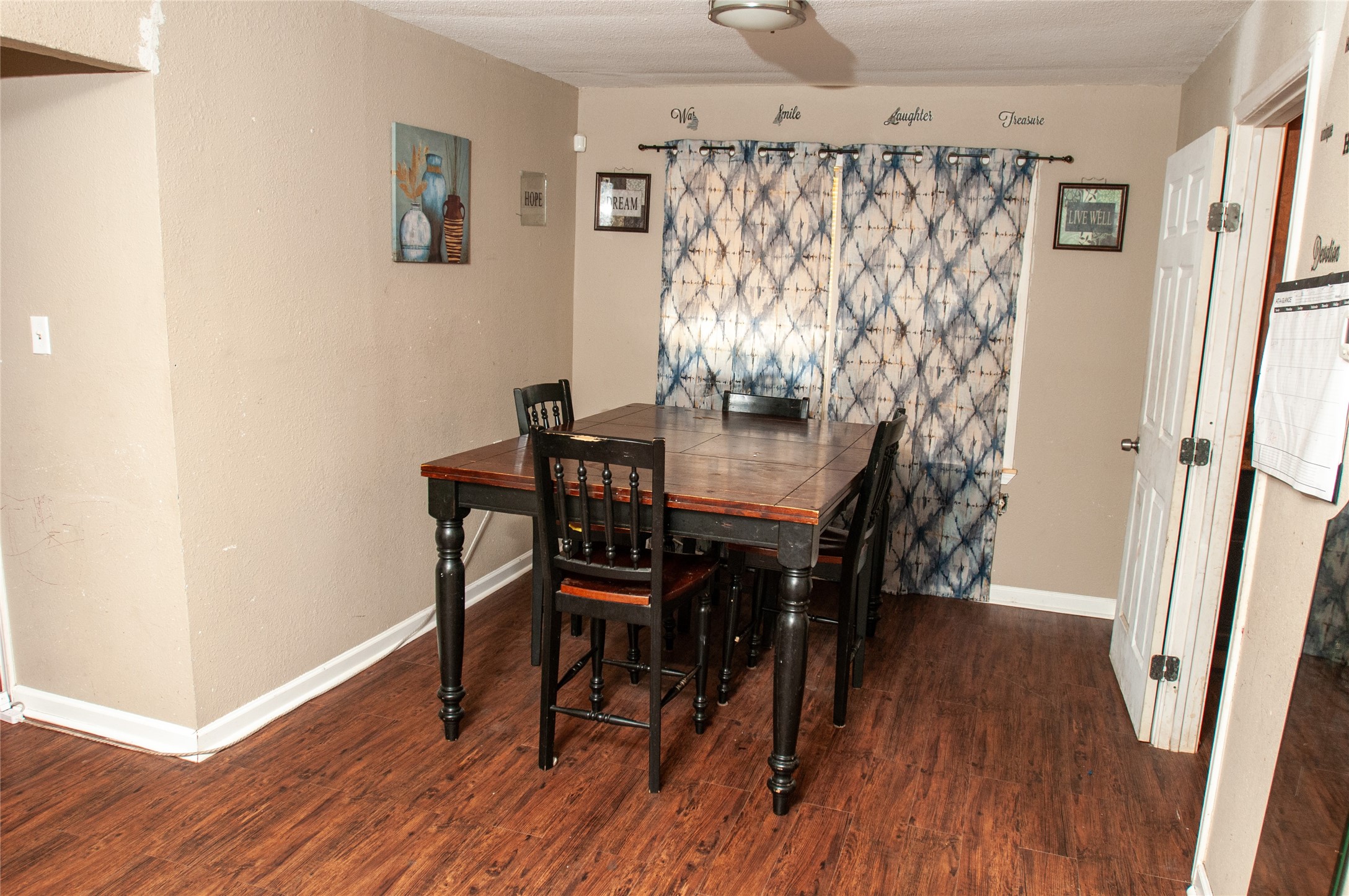 1601 Harris Street Wharton, TX 77488 - Photo 35 of 36 a view of a dining room with furniture and wooden floor