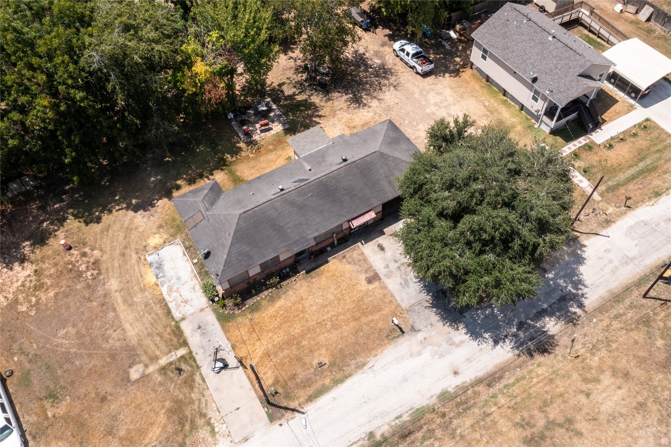 1601 Harris Street Wharton, TX 77488 - Photo 7 of 36 an aerial view of residential houses with outdoor space