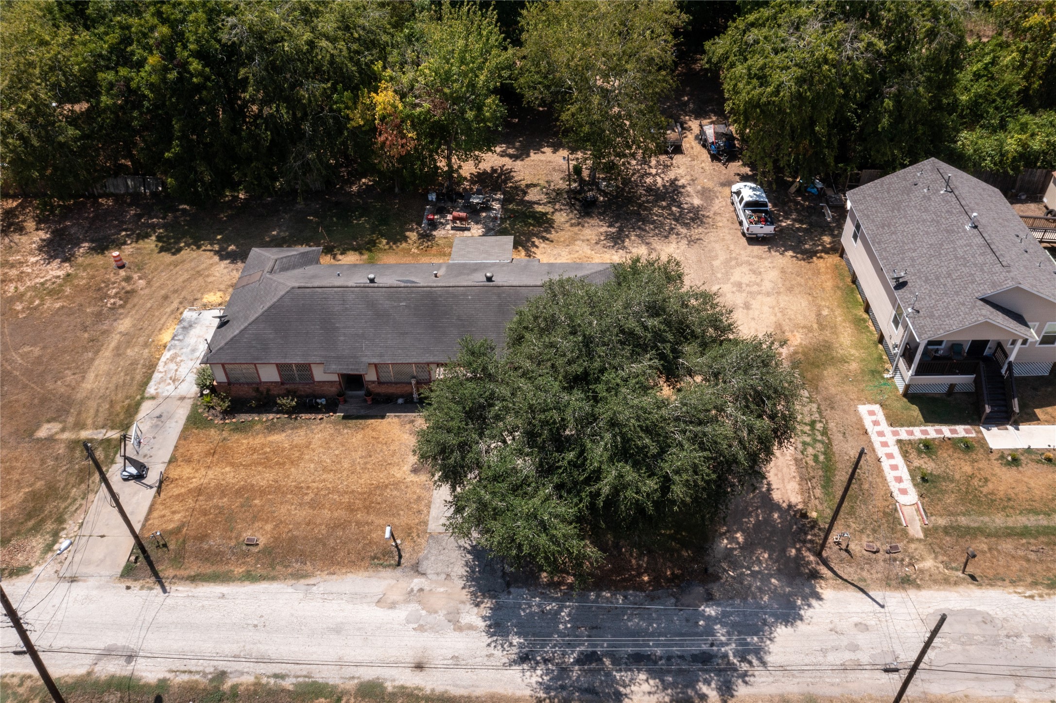 1601 Harris Street Wharton, TX 77488 - Photo 8 of 36 a view of a backyard