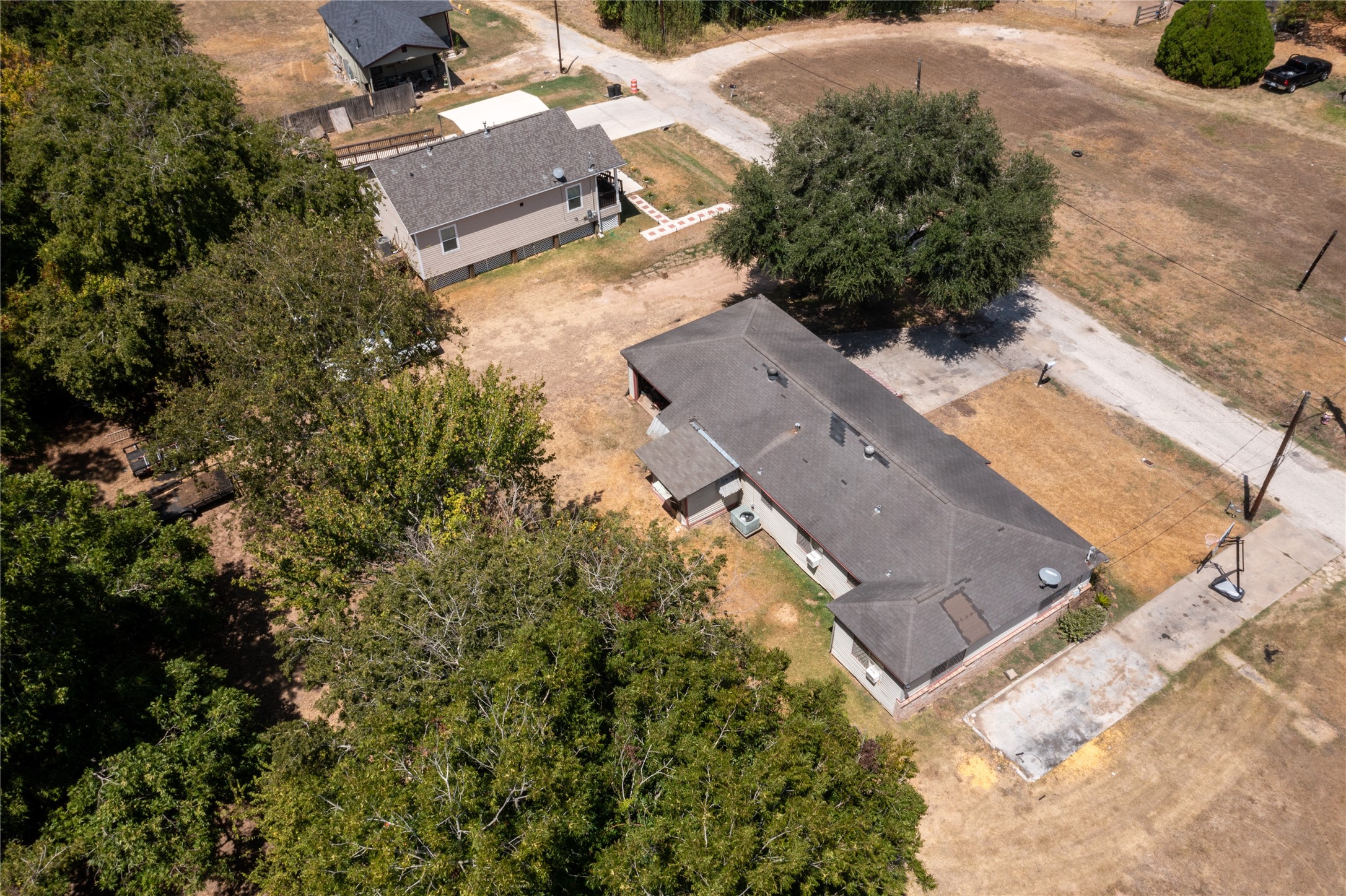 1601 Harris Street Wharton, TX 77488 - Photo 9 of 36 an aerial view of a house with a yard