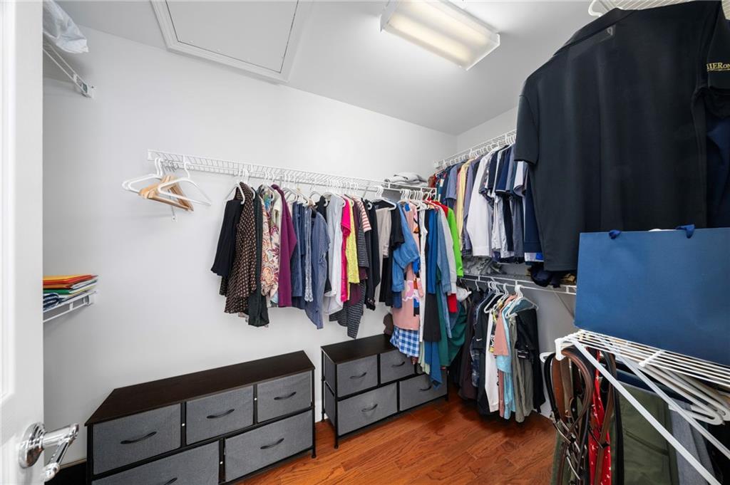 2872 Overlook Way Northeast Atlanta, GA 30324 - Photo 23 of 47 a view of walk in closet with clothes