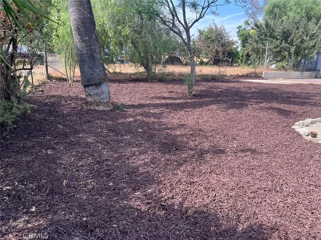 view of outdoor space with wooden fence