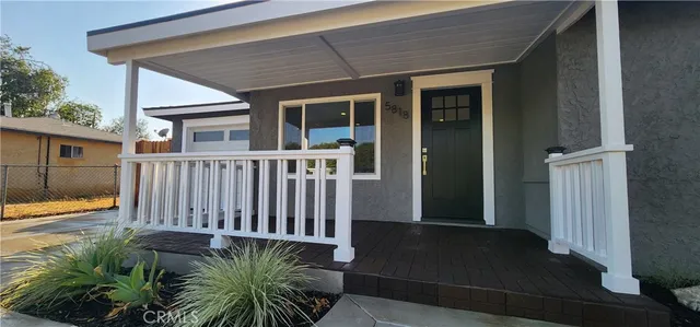 a view of a house with a patio