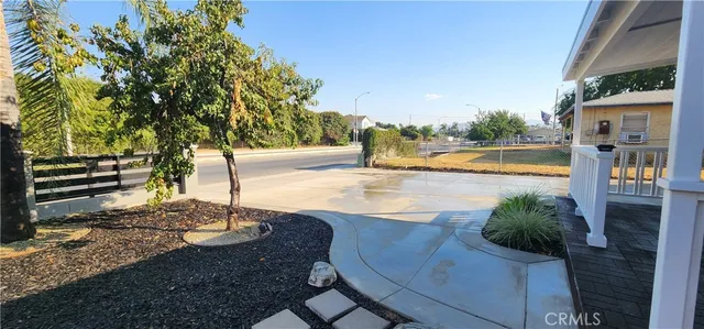 a view of a swimming pool with a patio