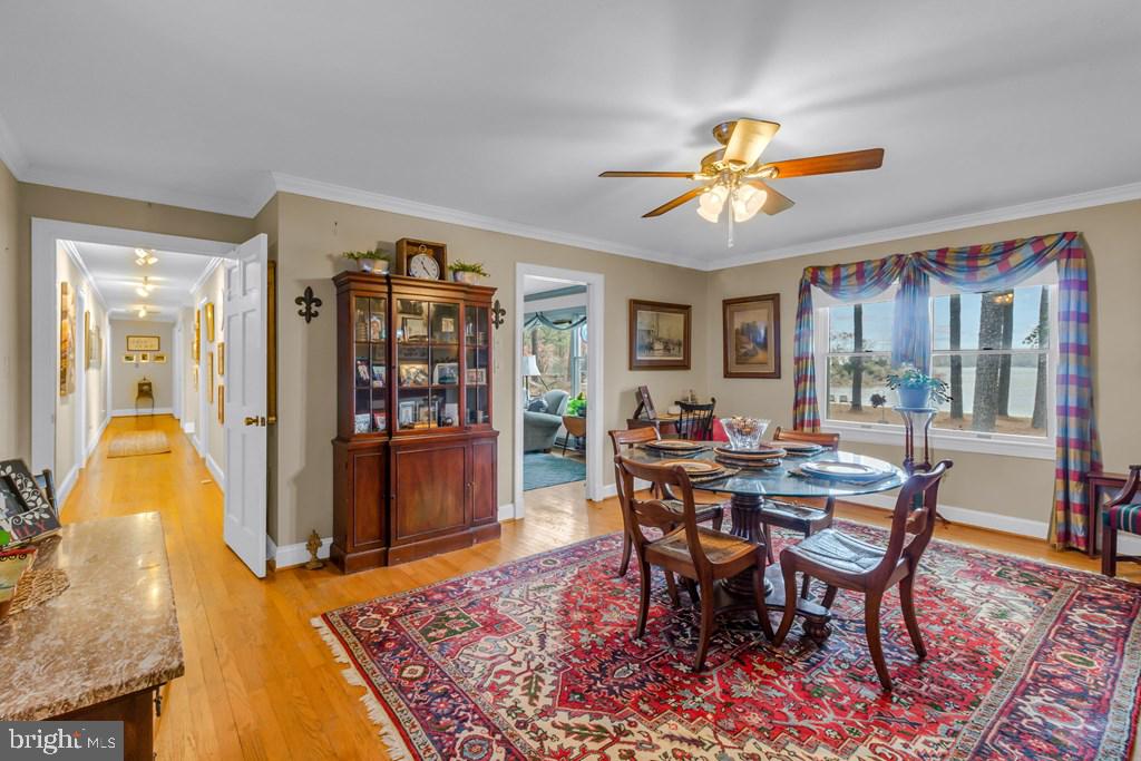 405 Courtney Lane Callao, VA 22435 - Photo 12 of 60 a view of a dining room with furniture window and wooden floor