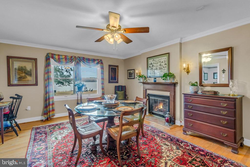 405 Courtney Lane Callao, VA 22435 - Photo 13 of 60 a dining room with furniture and window