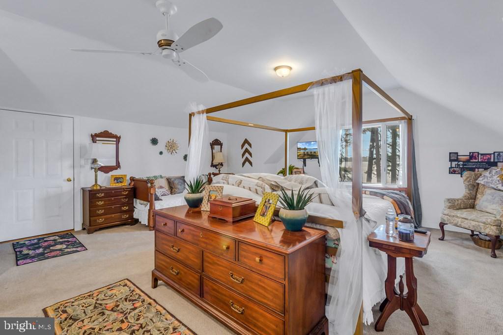 405 Courtney Lane Callao, VA 22435 - Photo 28 of 60 a bed room with furniture and a window