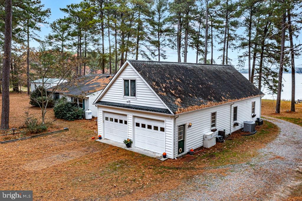 405 Courtney Lane Callao, VA 22435 - Photo 48 of 60 a view of a house with a yard