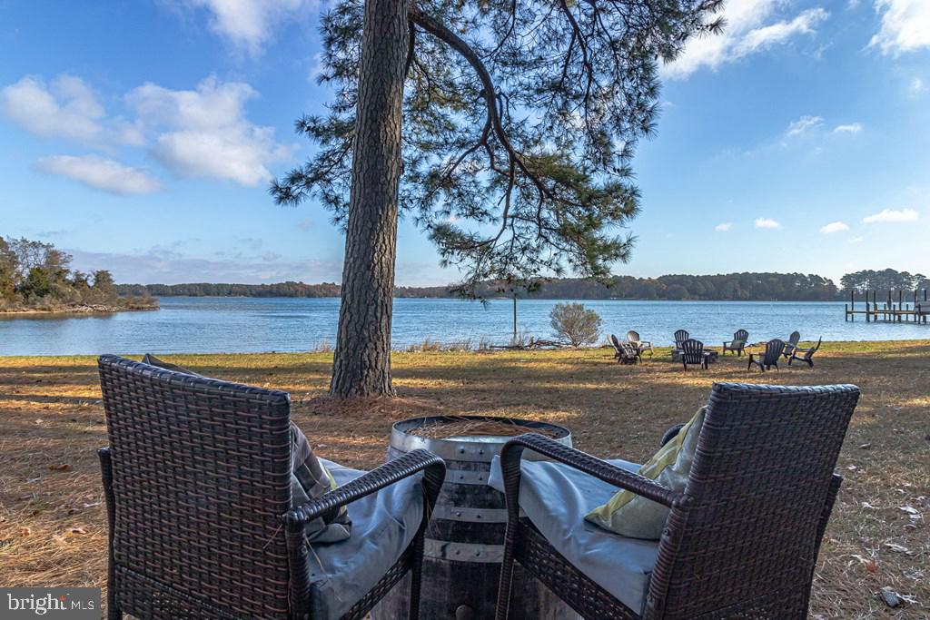 405 Courtney Lane Callao, VA 22435 - Photo 53 of 60 a view of a terrace with outdoor seating and ocean view