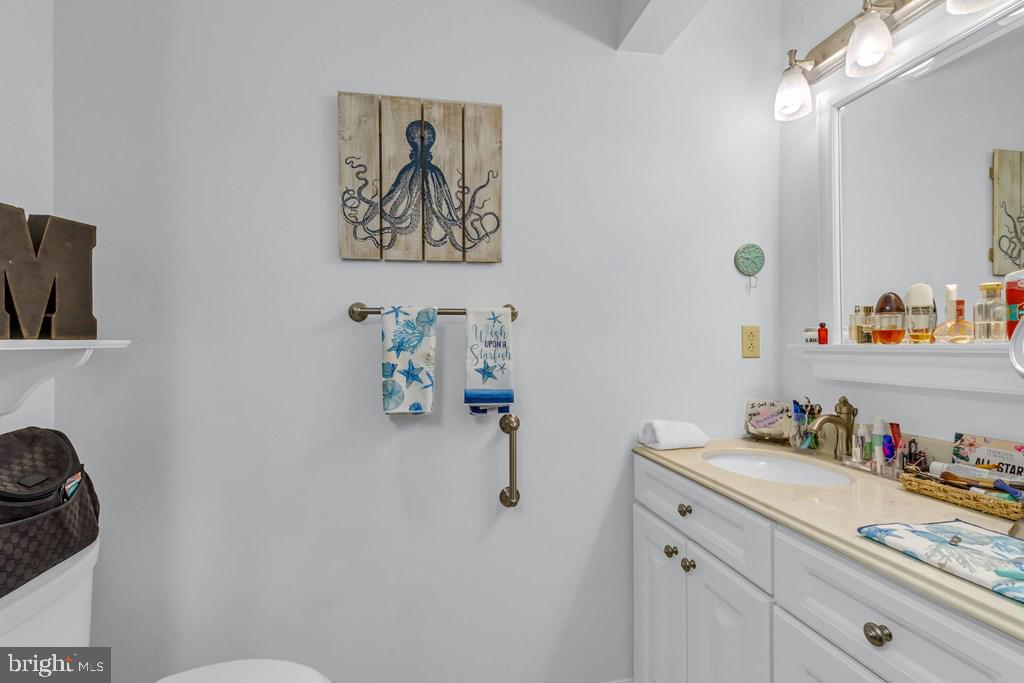 405 Courtney Lane Callao, VA 22435 - Photo 8 of 60 a bathroom with a sink and a mirror