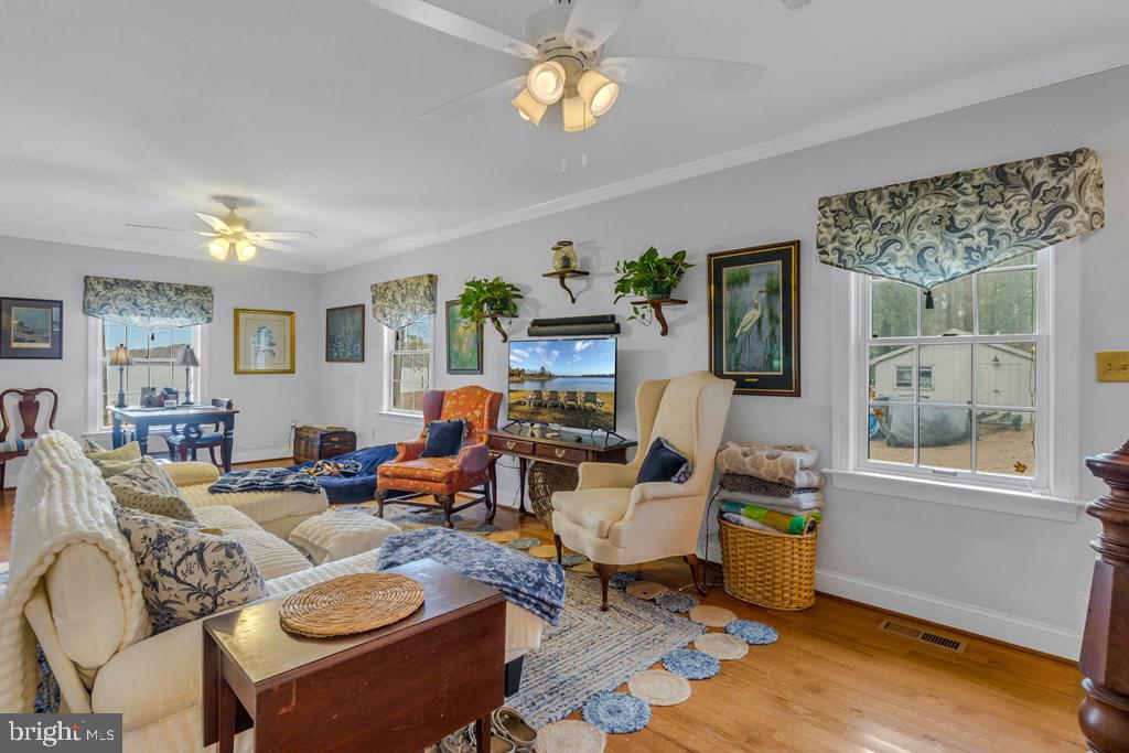 405 Courtney Lane Callao, VA 22435 - Photo 10 of 60 a living room with furniture and a table