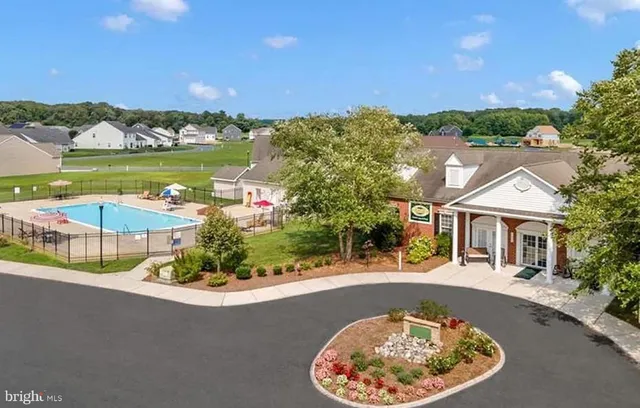 an aerial view of a house with mountain view