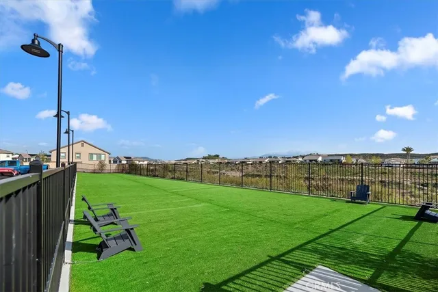 a view of a patio with swimming pool