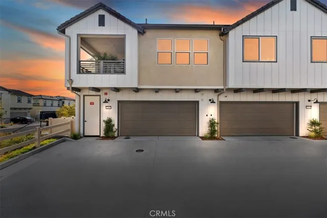a view of a house with many windows