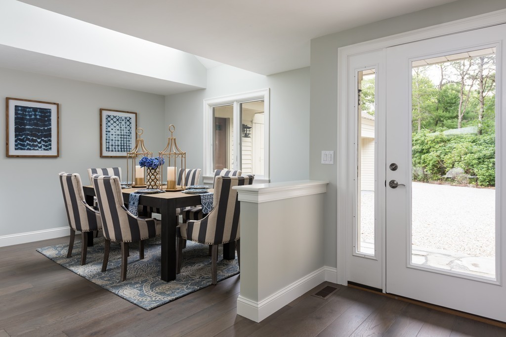 148 Paddock Circle Mashpee, MA 02649 - Photo 11 of 28 a view of a dining room with furniture and window